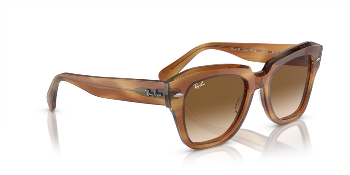 reval-myl-photo:RB2186_140351:0rb2186_140351_p21_shad_al2 #color_marron-a-rayas-transparente-y-marron